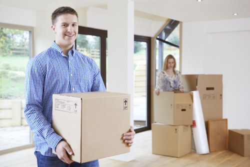 Packed office boxes and labeled items for commercial moves in Queenspark