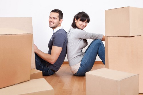 Careful handling of fragile items during packing and unpacking services in Queenspark