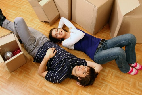Careful wrapping of fragile household items during packing